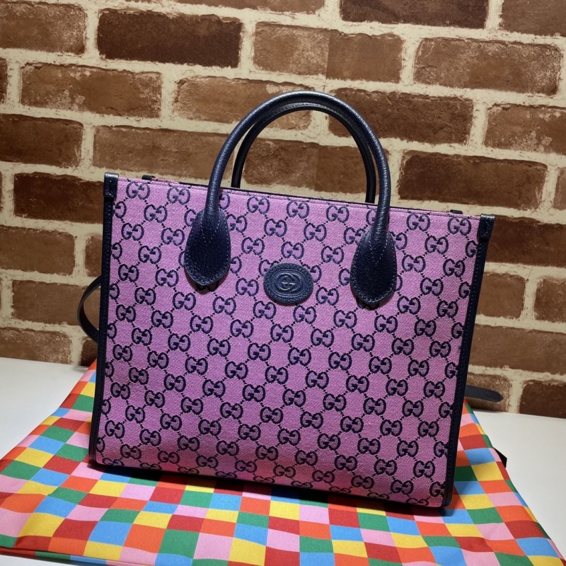 G*u*i shopping bags